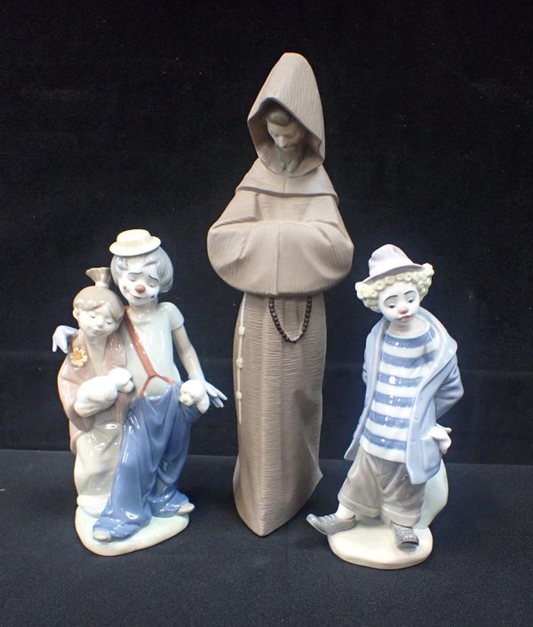 LLADRO: A BISQUE FIGURE OF A MONK