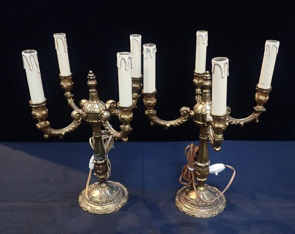 A PAIR OF BRASS FOUR LIGHT ELECTRIC TABLE LAMPS