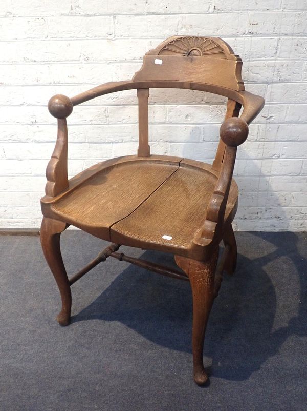 A VICTORIAN OAK DESK CHAIR