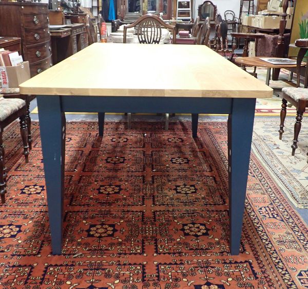 A MODERN ASH-TOPPED DINING TABLE