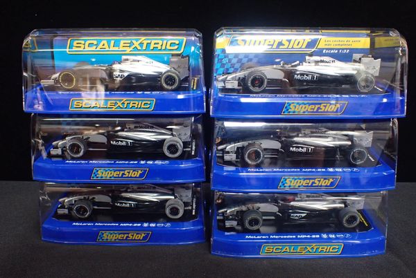 SIX BOXED SCALEXTRIC 'McLAREN MERCEDES' F1 CARS