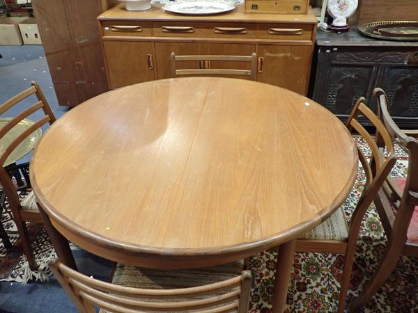 A GOMME G-PLAN MID-CENTURY TEAK DINING SUITE