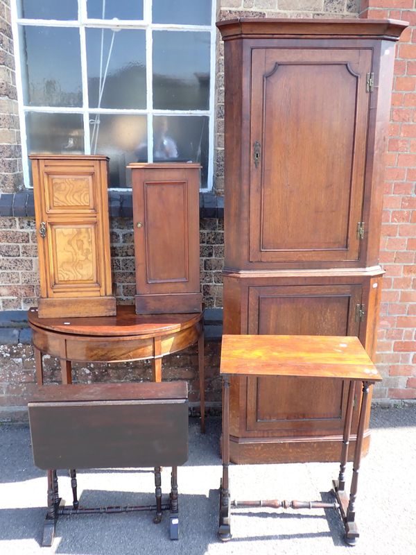 A GEORGE III OAK TWO TIER CORNER CUPBOARD