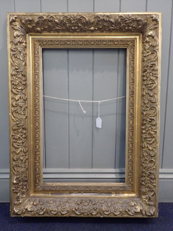 A 19th CENTURY MOULDED AND GILT PICTURE FRAME