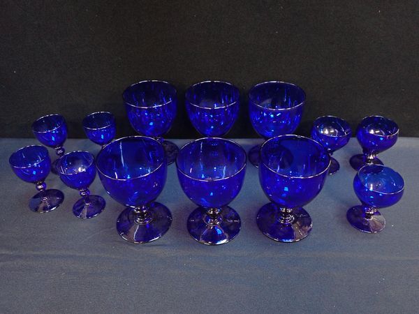 A COLLECTION OF BRISTOL BLUE DRINKING GLASSES