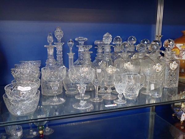 A COLLECTION OF EIGHT 19TH CENTURY LATER CUT GLASS SQUARE DECANTERS