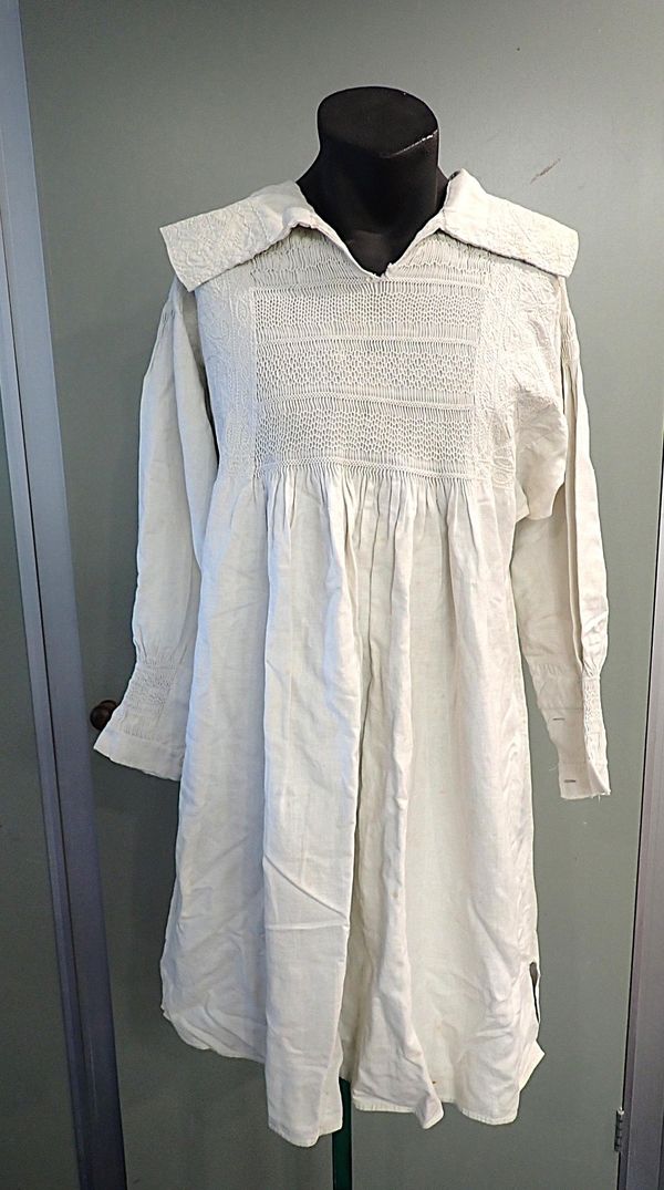 A 19th CENTURY LINEN SMOCK