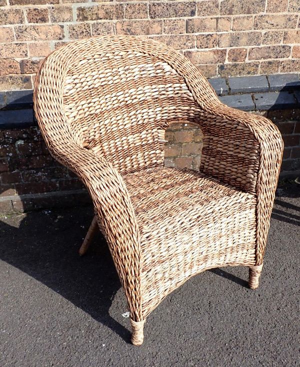 A WOVEN CONSERVATORY CHAIR