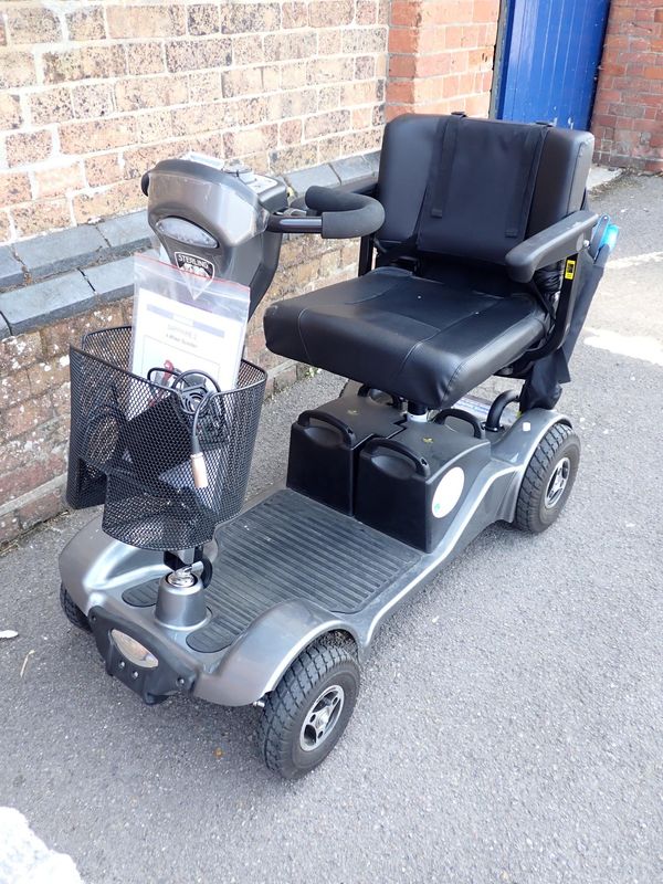 A STERLING SAPPHIRE 2 FOUR-WHEEL MOBILITY SCOOTER