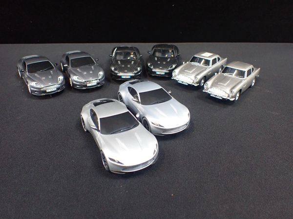 EIGHT UNBOXED SCALEXTRIC 'ASTON MARTIN' CARS