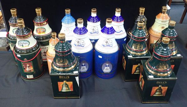 A COLLECTION OF BELLS WHISKY DECANTERS, ALL SEALED AND BOXED