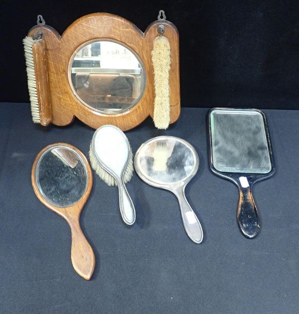 A GROUP OF HAND AND HANGING MIRRORS