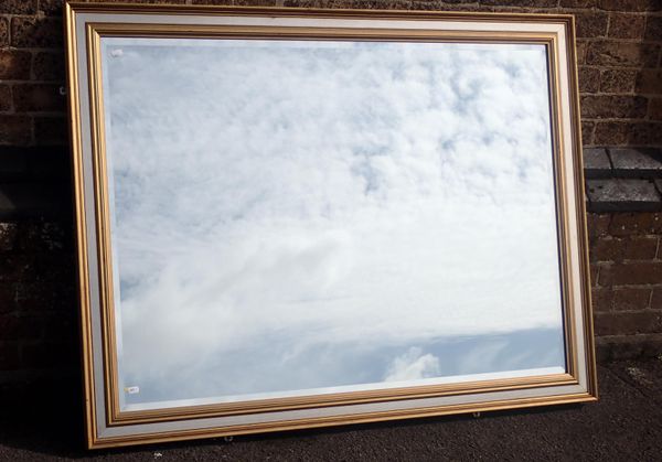 A  LARGE WALL MIRROR, GILT AND SILVERED FRAME