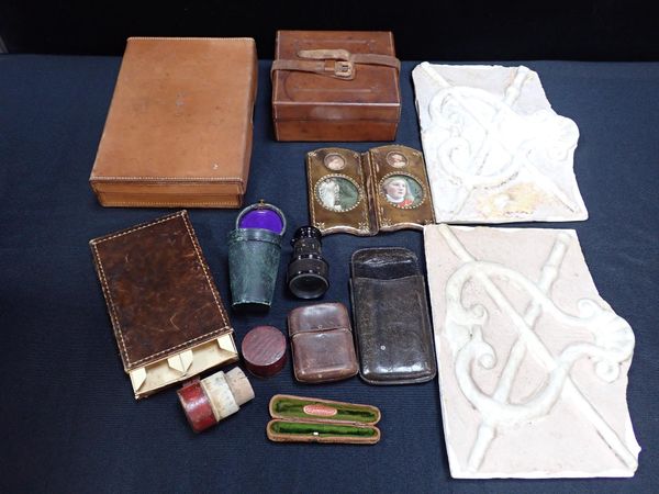 A TOOLED LEATHER PHOTO FRAME