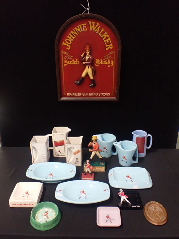 A COLLECTION OF JOHNNIE WALKER ADVERTISING ITEMS