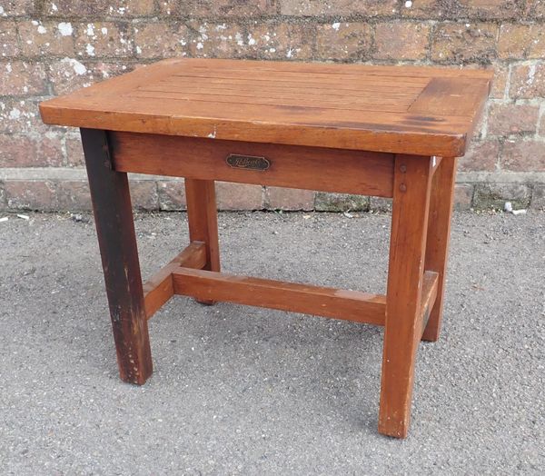A STOOL MADE FROM THE TIMBER OF THE ADMIRALTY YACHT ENCHANTRESS