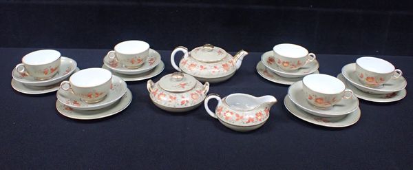 A MINIATURE TEA SET FOR SIX