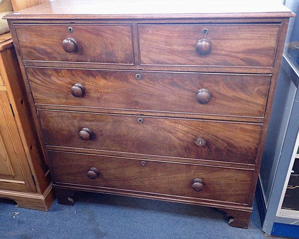 A 19th CENTURY FIGURED MAHOGANY CHEST OF DRAWERS