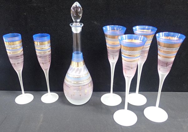 A SET OF ART GLASS FLUTES  AND MATCHING DECANTER