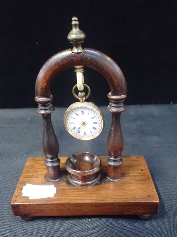 A 19th CENTURY ROSEWOOD POCKET WATCH STAND