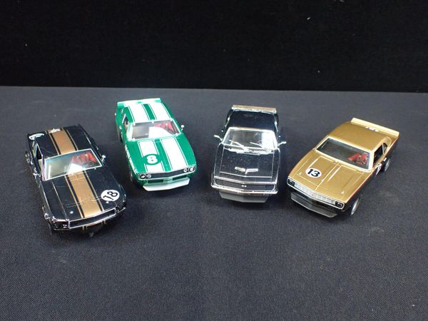 FOUR PIONEER SLOT CARS