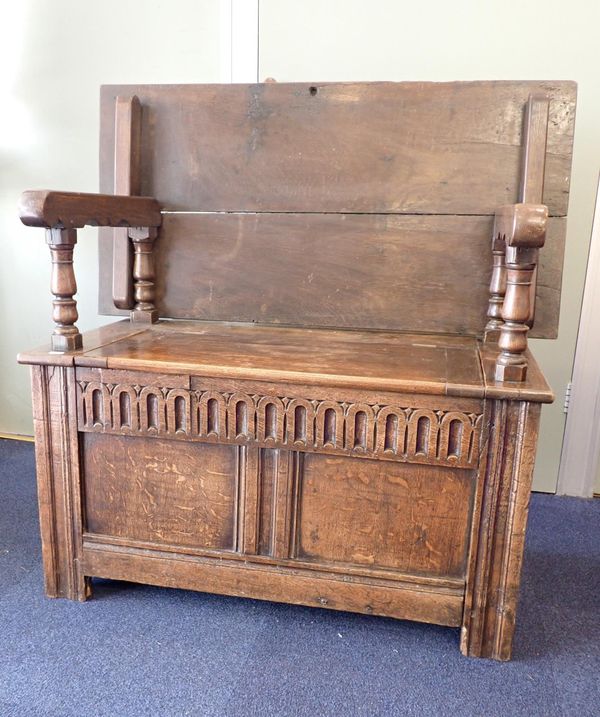 AN OAK 'MONK'S BENCH', WITH FOLD-OVER TOP