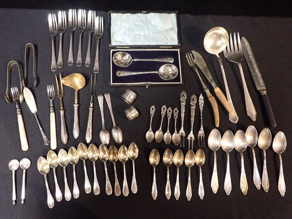 A COLLECTION OF WHITE METAL AND SILVER-PLATED FLATWARE