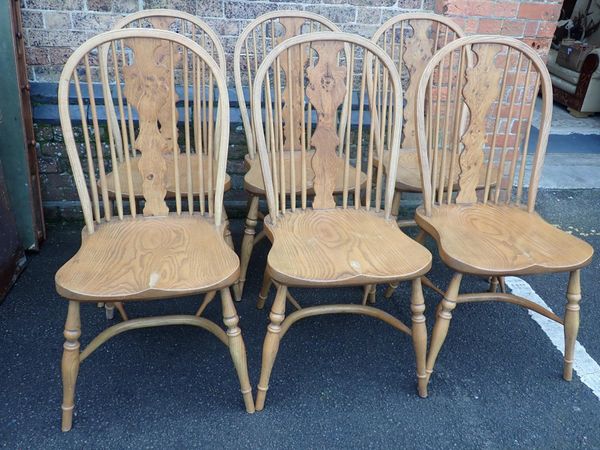 A SET OF SIX ASH HOOP-BACK WINDSOR DINING CHAIRS