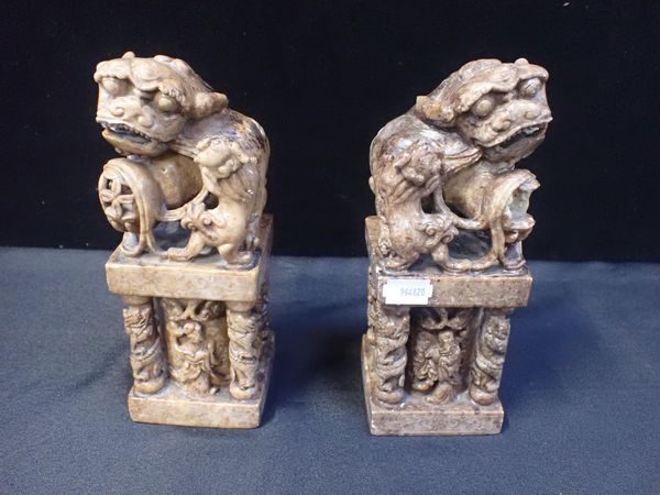 A PAIR OF CARVED  SOAPSTONE DOGS OF FO