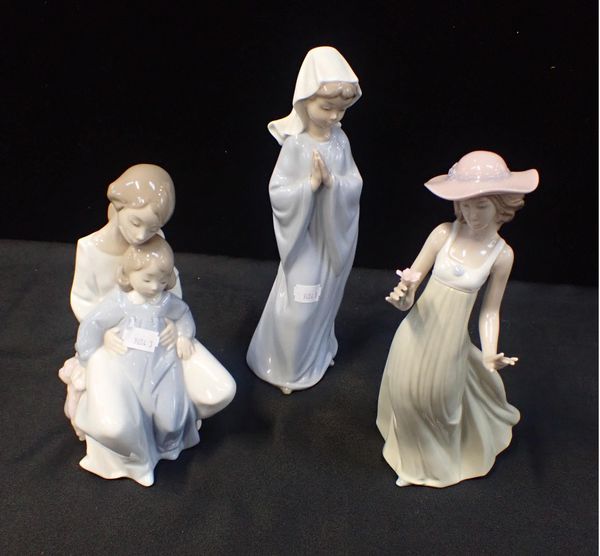 THREE NAO FIGURINES