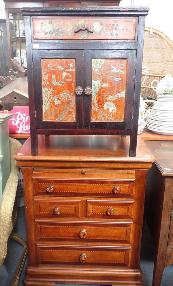 A BEDSIDE CABINET WITH CHINOISERIE DECORATION