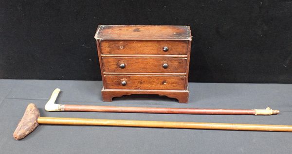 A 19th CENTURY MAHOGANY MINIATURE CHEST OF DRAWERS