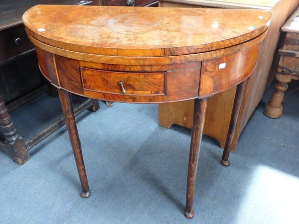 A GEORGE III AND LATER FIGURED WALNUT SEMI CIRCULAR CARD TABLE