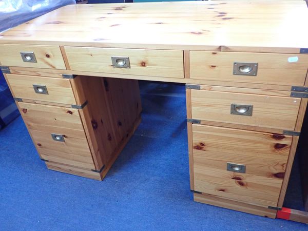 A MODERN PINE PEDESTAL DESK