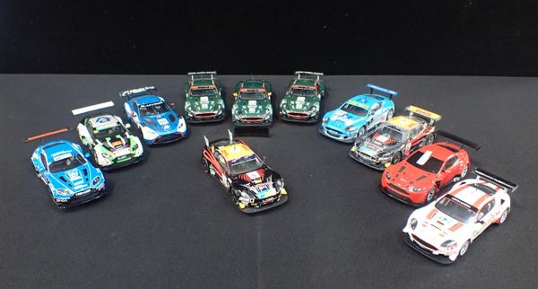 ELEVEN UNBOXED SCALEXTRIC 'ASTON MARTIN' RACE CARS