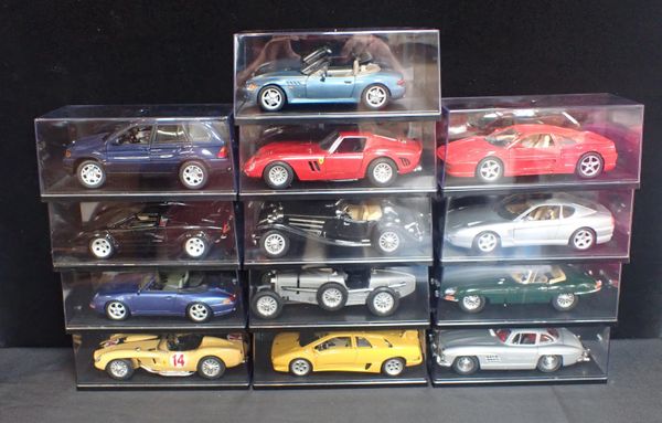 THIRTEEN BOXED DIECAST SCALE 1:18 MODEL CARS