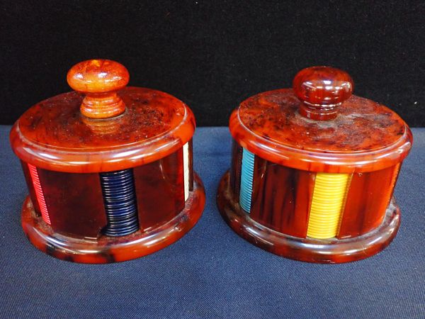 A PAIR OF VINTAGE  CASINO GAMING CHIP HOLDERS