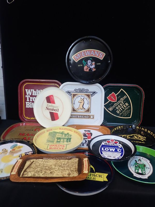 A COLLECTION OF PUB ADVERTISING TRAYS