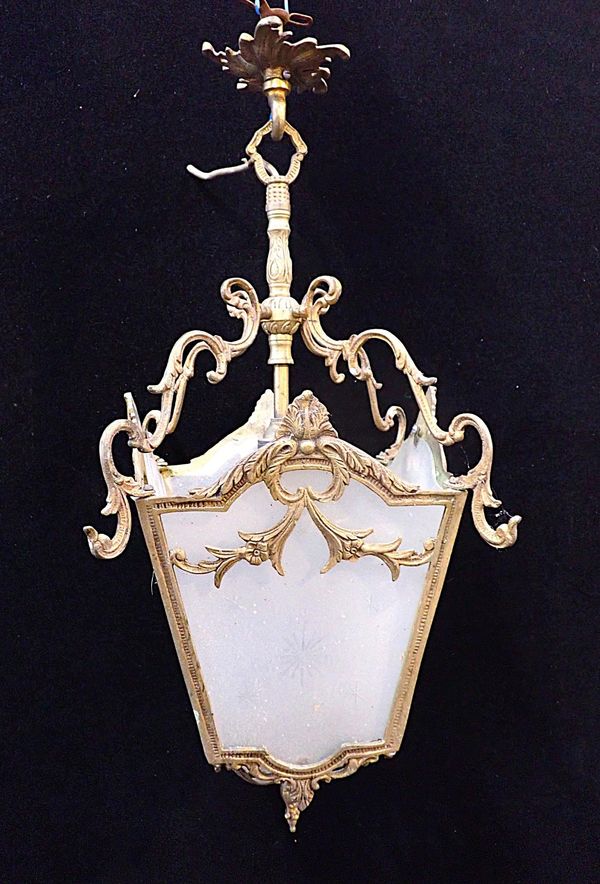 A ROCOCO STYLE BRASS-FRAMED HALL LANTERN