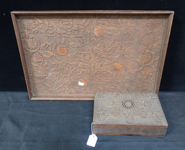 A CARVED WOODEN TRAY, DATED JANUARY 1913