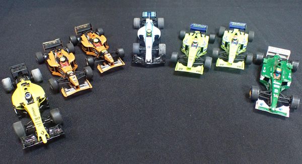 SEVEN UNBOXED SCALEXTRIC F1 CARS
