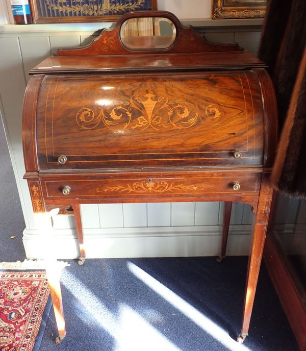 AN EDWARDIAN ROSEWOOD CYLINDER BUREAU