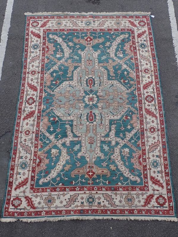 A SOUMAKH RUG, GREEN GROUND