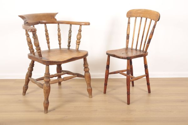 A VICTORIAN BEECHWOOD AND ELM SMOKERS BOW ARMCHAIR
