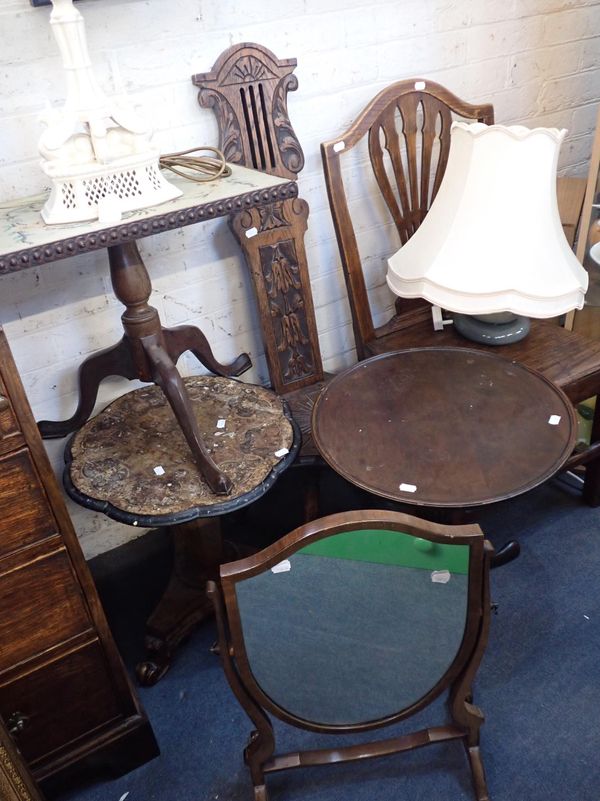 AN EDWARDIAN CARVED OAK 'SPINNING CHAIR'