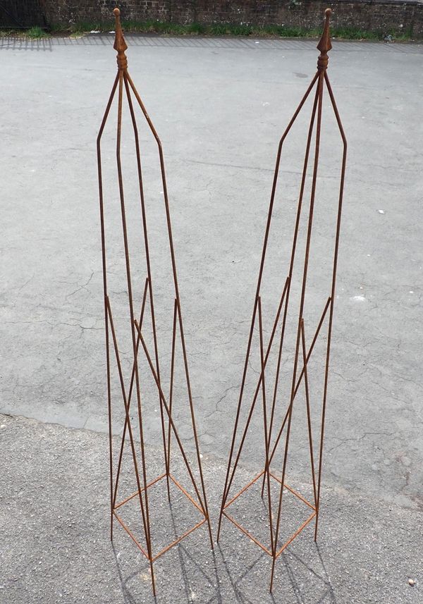 A PAIR OF METAL GARDEN OBELISKS