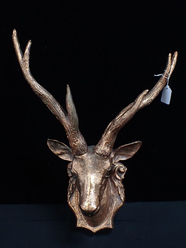 A KITSCH WALL-MOUNTED DEER HEAD