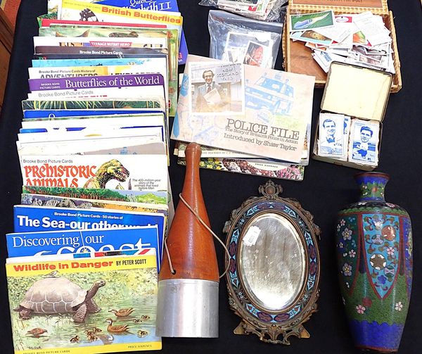 A 19th CENTURY CAST BRASS AND ENAMELLED OVAL MIRROR