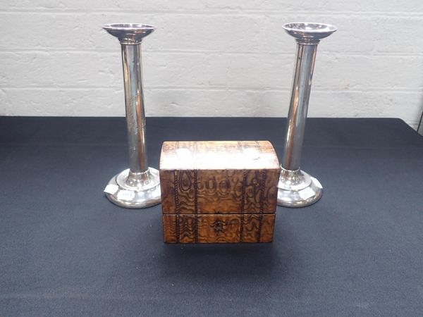 A PAIR OF STERLING SILVER CANDLESTICKS