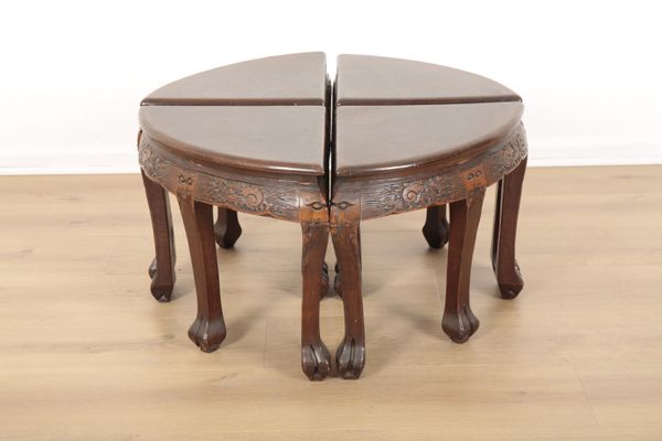 A CHINESE CARVED WOOD SECTIONAL OCCASIONAL TABLE